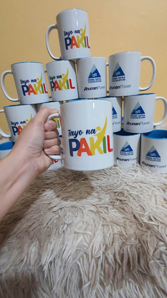 Stack of sublimation printed souvenir mugs